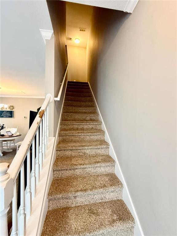 staircase with baseboards
