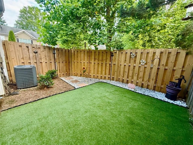 fenced backyard with central air condition unit