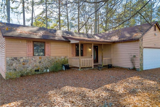 single story home featuring a garage