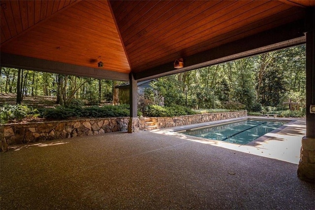 view of pool featuring a patio area