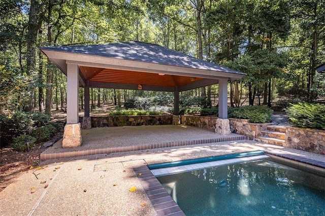 view of swimming pool with a gazebo