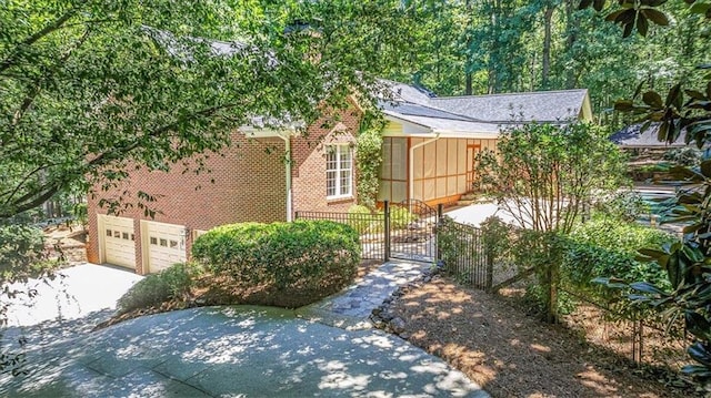 view of front of property with a garage