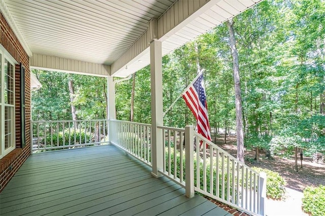 wooden deck featuring covered porch