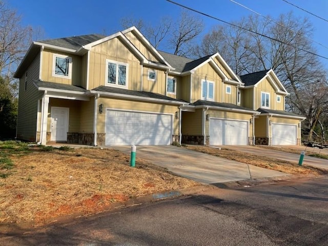 craftsman house with a garage