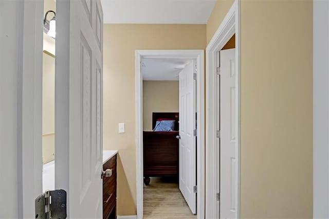 hallway featuring light wood-type flooring