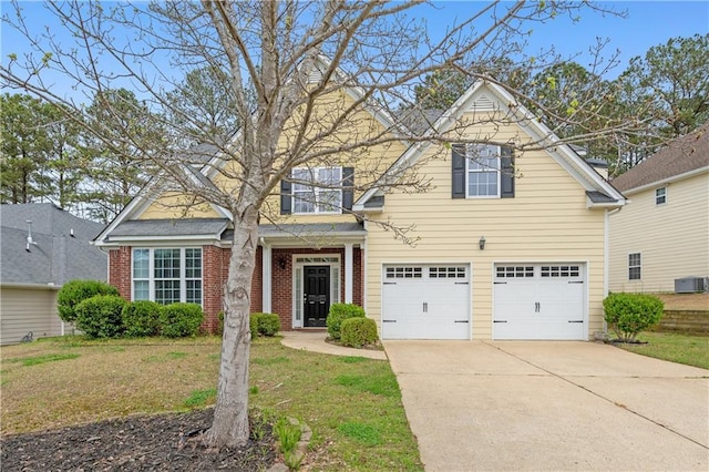 140 Silver Oak Dr, Dallas, GA 30132 - traditional-style home featuring a garage, a front yard, brick siding, concrete driveway, and central AC unit