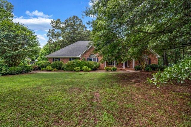 362 Clyde Ct, Mcdonough, GA 30252 - view of front of home with a front yard