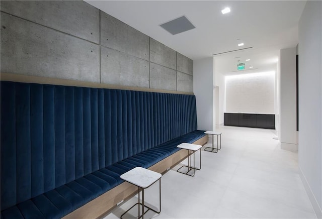 hallway with light tile floors