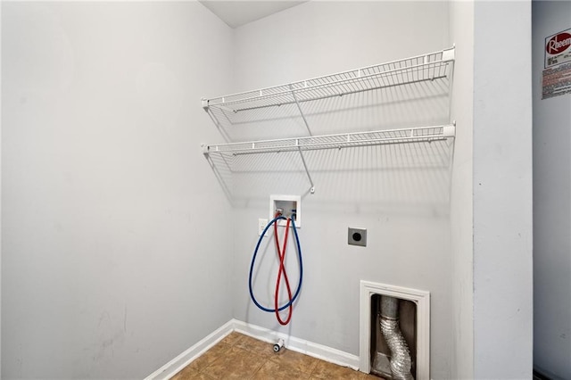 clothes washing area featuring tile patterned floors, gas dryer hookup, hookup for a washing machine, and hookup for an electric dryer