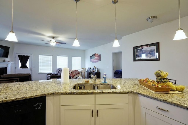 kitchen with white cabinetry, dishwasher, sink, and pendant lighting