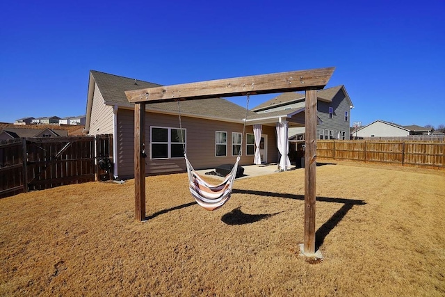 back of house featuring a patio