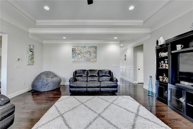 living area with crown molding, recessed lighting, and wood finished floors