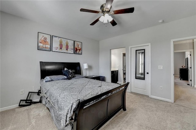 bedroom featuring light carpet, baseboards, and ceiling fan
