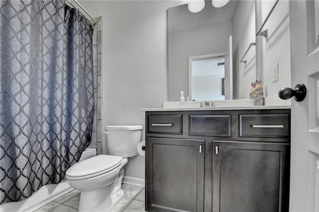full bath featuring toilet, vanity, baseboards, and shower / bath combination with curtain