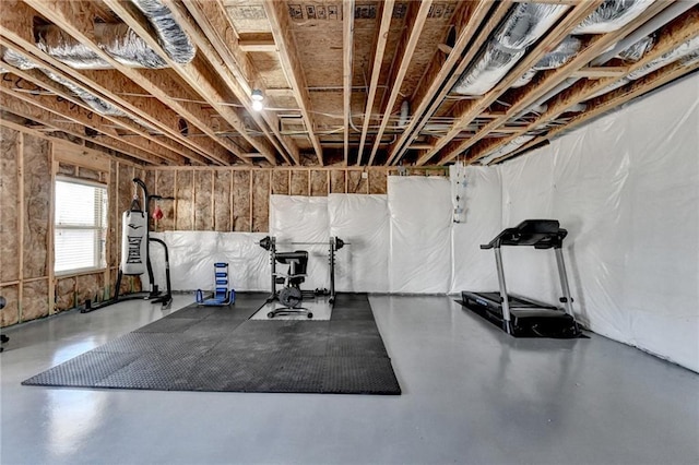 exercise room featuring water heater