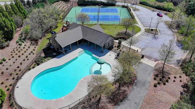 pool with a patio area