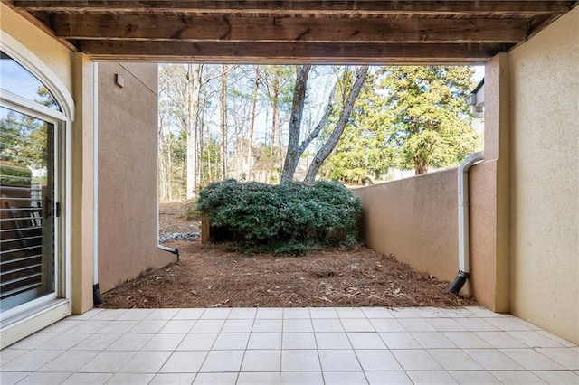 view of patio featuring fence