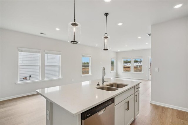 2026 Avalon Rdg, Conyers, GA 30013 - unfurnished living room featuring sink and light hardwood / wood-style flooring