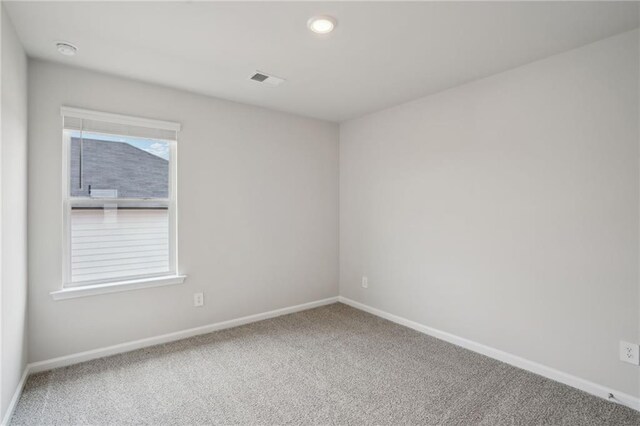 2026 Avalon Rdg, Conyers, GA 30013 - unfurnished bedroom with light colored carpet