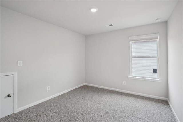 2026 Avalon Rdg, Conyers, GA 30013 - unfurnished bedroom featuring light colored carpet