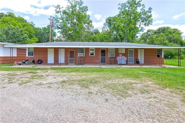 3494 Ga Highway 85 E, Manchester, GA 31816 - ranch-style home featuring brick siding and a front yard