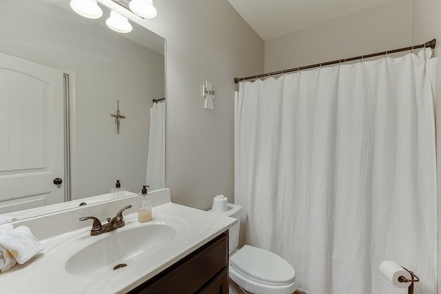 full bath with vanity and toilet