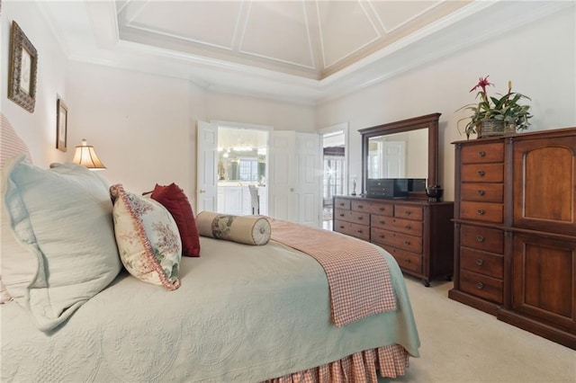 bedroom featuring crown molding, connected bathroom, coffered ceiling, and light colored carpet