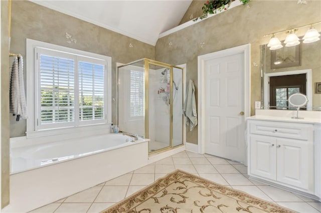 bathroom with tile patterned flooring, vanity, lofted ceiling, and plus walk in shower