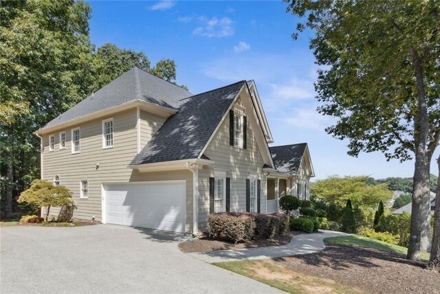 view of home's exterior with a garage