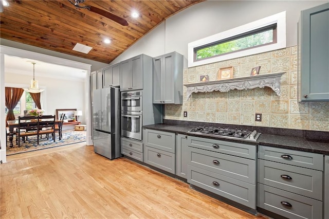 315 W Ave, Cartersville, GA 30120 - kitchen with stainless steel appliances, gray cabinetry, lofted ceiling, wooden ceiling, and dark countertops