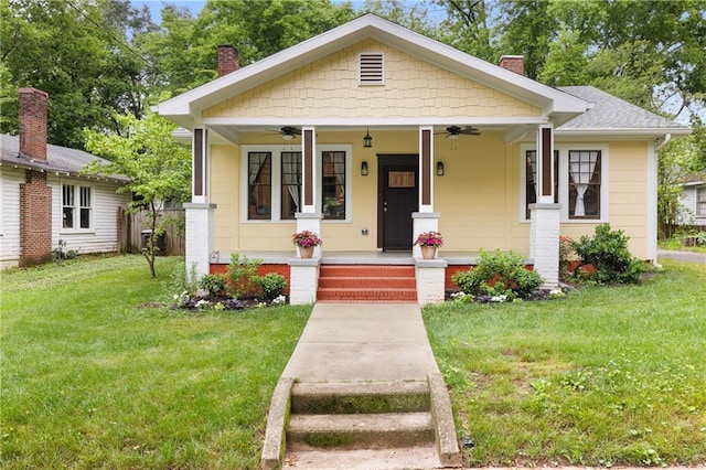 315 W Ave, Cartersville, GA 30120 - bungalow-style house with a chimney, ceiling fan, a front lawn, and covered porch