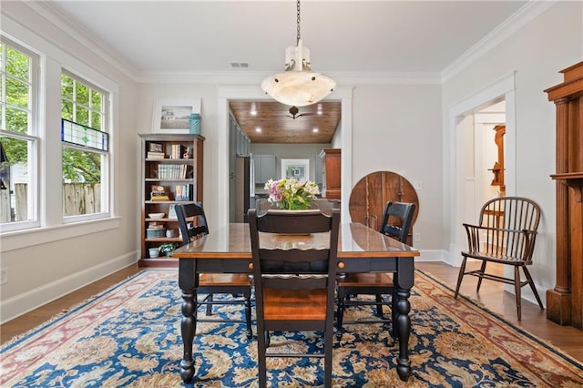 315 W Ave, Cartersville, GA 30120 - dining space featuring ornamental molding, wood finished floors, and baseboards