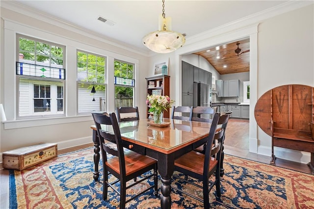 315 W Ave, Cartersville, GA 30120 - dining space featuring ornamental molding, baseboards, and light wood finished floors