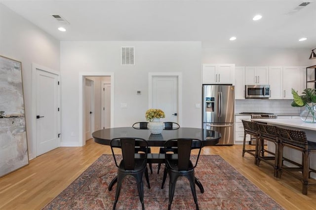 dining area featuring light hardwood / wood-style floors