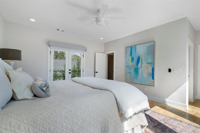 bedroom with ceiling fan, access to exterior, french doors, and hardwood / wood-style flooring