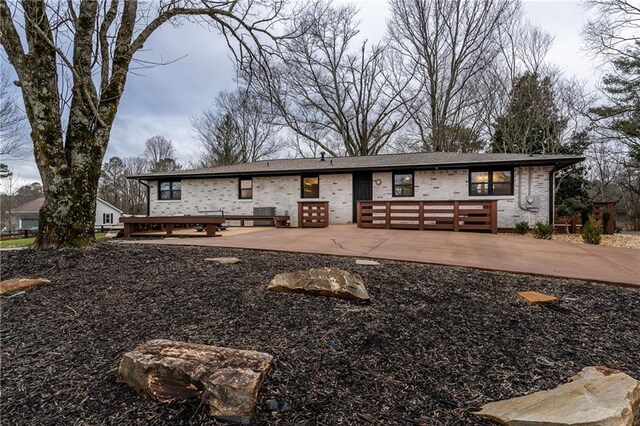 view of patio / terrace with a garage