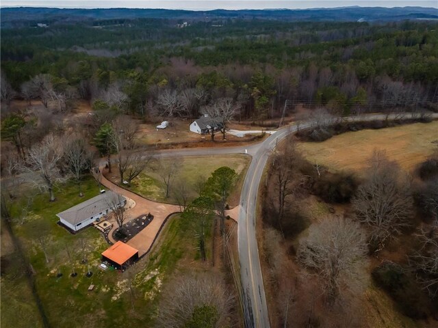 bird's eye view featuring a mountain view and a rural view