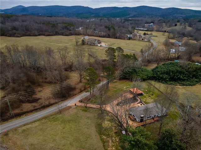 drone / aerial view featuring a mountain view