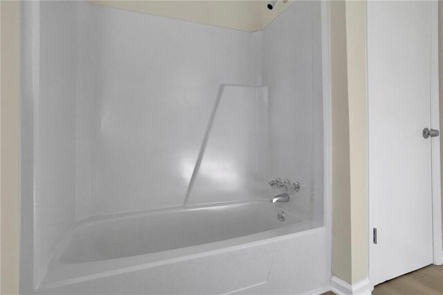 bathroom featuring tub / shower combination