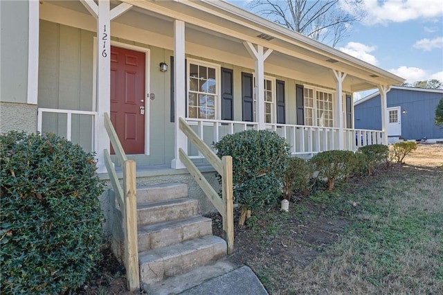 property entrance with a porch