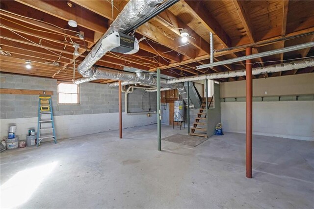 basement with strapped water heater