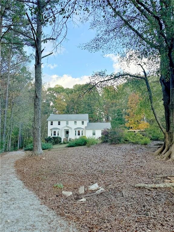 birds eye view of property featuring a rural view