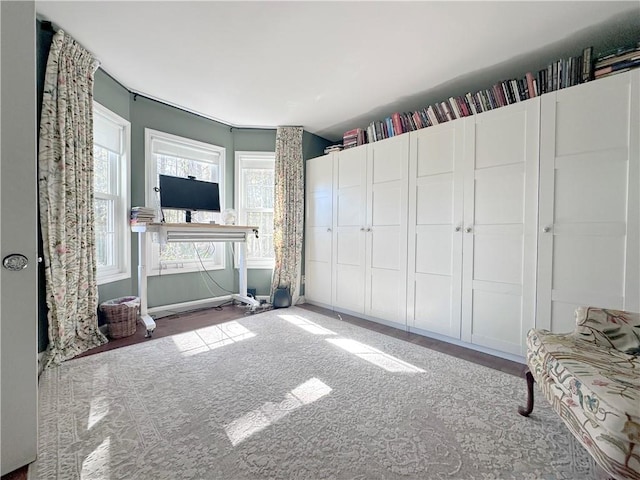 living room with ornamental molding and dark hardwood / wood-style floors