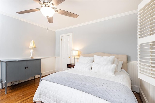 2197 Fairway Cir NE, Brookhaven, GA 30319 - bedroom with wood finished floors, ornamental molding, a wainscoted wall, and ceiling fan