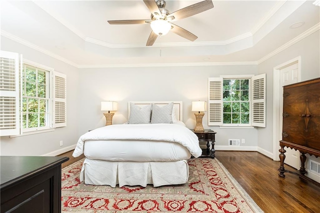2197 Fairway Cir NE, Brookhaven, GA 30319 - bedroom featuring a raised ceiling, wood finished floors, baseboards, crown molding, and ceiling fan
