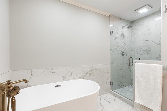 2197 Fairway Cir NE, Brookhaven, GA 30319 - full bathroom featuring a soaking tub, a marble finish shower, marble finish floors, and crown molding