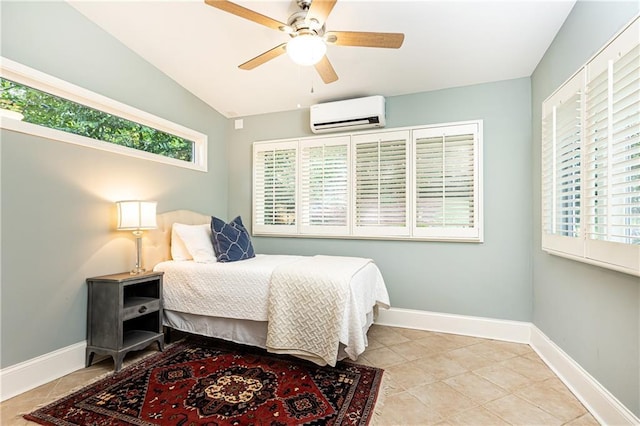 2197 Fairway Cir NE, Brookhaven, GA 30319 - bedroom with a wall mounted AC, baseboards, light tile patterned floors, and lofted ceiling