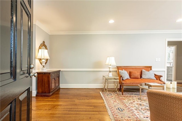 2197 Fairway Cir NE, Brookhaven, GA 30319 - living area featuring wood finished floors, crown molding, recessed lighting, and baseboards