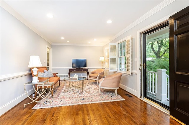 2197 Fairway Cir NE, Brookhaven, GA 30319 - living area with wood finished floors, baseboards, ornamental molding, and recessed lighting