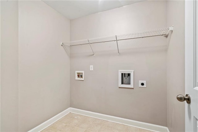 clothes washing area featuring electric dryer hookup and washer hookup